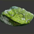 Natural Stone With Lush Green Moss Covering Its Textured Surface And Organic Details