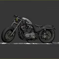 Classic Silver and Black Motorcycle with Large Tires on Brick Platform
