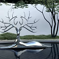 Landscape Sculpture Silver Deer Head With Branch Like Antlers On Water Surface Trees And Grass