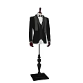 Model Wearing Formal Gray Tuxedo With Vest Bow Tie And Striped Accents