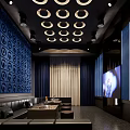 Modern KTV Interior Design With Blue Circular Patterned Walls Dark Sofas And Large Screen TV 3d model