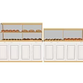 White Display Shelves with Transparent Glass Doors Showcasing Donuts and Bread in Bakery Shop
