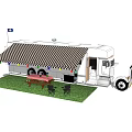 Recreational Vehicle With Checkered Awning Outdoor Red Table Black Chairs On Green Grass