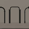 Black Arched Doorways In Minimalist Room With Beige Walls Wooden Floor And Plant
