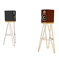 Wooden And Black Speakers On Metal Stands For Audio System Setup