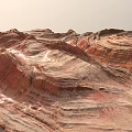 Stunning Layered Red Orange Mountain Landscape with Natural Geological Textures and Terrain