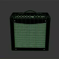 Portable Black Electric Guitar Amplifier With Control Knobs And Speaker Grille
