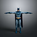 Batman Character in Blue Gray Costume With Yellow Belt Cape and Mask Standing Arms Outstretched
