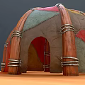 Dome Shaped Colorful Patchwork Tent With Wooden Poles And Traditional Fabric Design
