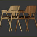 Two Modern Wooden Armchairs With Different Seat Colors And Natural Wood Frames