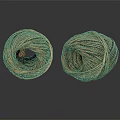 Two Brown Coiled Twine Balls Placed On Black Reflective Surface 3d model