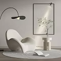 Plush Modern Leisure Chair With Floor Lamp Artwork Side Table And Plant On Round Rug