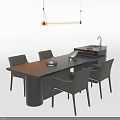 Modern Black Dining Table With Gray Chairs And Pendant Light In Kitchen Area