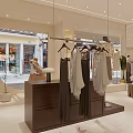 Modern Clothing Store Interior With Hanging Garments Wooden Display Counter And Mirrors