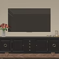 Dark Gray TV Stand With Gold Accents Vase Red Flowers And Wooden Floor