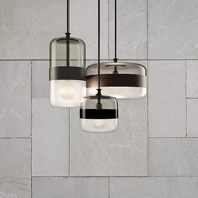Modern Glass Pendant Lights With Different Designs And Metal Accents Hanging On Gray Wall 3d model