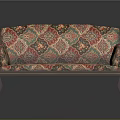 Vintage Sofa Upholstered With Intricate Colorful Pattern And Wooden Frame