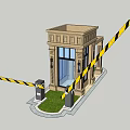 Small Security Booth Entrance With Yellow Black Striped Tape And Green Lawn