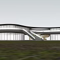 Modern Sales Office Building with Curved Glass Facade Surrounded by Grass Trees and Illuminated Interior
