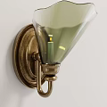 Vintage Brass Wall Sconce With Green Glass Shade And Curved Design