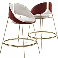 Modern Elegant Bar Stools With Red And White Velvet Upholstery And Golden Metal Frame