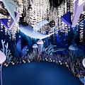 Whimsical Underwater Scene with Giant Whale Jellyfish Coral Seagrass and Illuminated Decorations