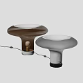 Modern Mushroom Shaped Table Lamps Brown And White With Black Bases Illuminated On White Background