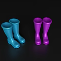 Two Pairs of Stylish Blue and Purple Rain Boots on Black Background