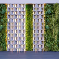 Modern Green Plant Wall Design With Vertical Grid Structure And Lush Foliage