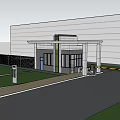 TDK Office Building Exterior With Modern Architecture And Landscaped Entrance Area
