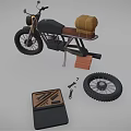 Vintage Motorcycle Being Repaired With Detached Wheel Tools And Brown Seat Bag