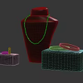 Elegant Jewelry Display Featuring Necklace Ring Earrings On Black Display Stand With Black Boxes