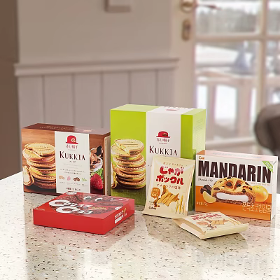 Assorted KUKA and Mandarin Cookies Snacks in Colorful Boxes with Displayed Treats 3d model