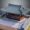 Traditional Korean Pavilion With Gray Tiled Roof And Red Columns By Stone Wall