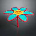 Artistic Decorative Plant With Red Stem Blue Petals And Yellow Center