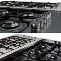 Modern Black Kitchen Appliances Collection With Gas Stove Refrigerator Coffee Maker And Oven