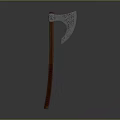 Decorative Axe With Wooden Handle And Ornate Metal Blade Design