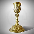 Luxurious Vintage Golden Goblet With Intricate Carved Patterns And Elegant Tall Stem Design