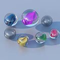Multiple Transparent Glass Spheres With Colored Liquid Interiors On Blue Background