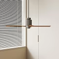 Modern Ceiling Fan with Wooden Blades and Metal Base Near Window Blinds and White Cabinet