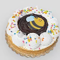 Cute Festive Cake With Whipped Cream Colorful Sprinkles And Little Bee Design On Golden Tray