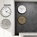 Multiple Modern Wall Clocks With Different Color Frames And Design Styles