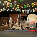 Harry Potter Themed Photo Spot With Castle Train Moon And Flags On Brick Wall