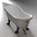 Elegant White Freestanding Bathtub With Chrome Claw Feet And Modern Design Style