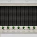 Large Black Grid Wall Fronted by Green Plants in White Pots on White Floor