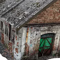 Dilapidated Industrial Factory Building With Weathered Walls Red Doors And Broken Windows