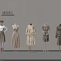 Clothes Display On Mannequins With Various Fashionable Styles And Plaid Designs