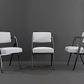Three Modern Leisure Chairs with White Cushioned Seats and Black Metal Frames