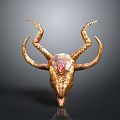 Golden Decorative Animal Skull with Curved Horns and Red Gemstone on Forehead