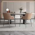 Modern Restaurant Interior With Round Dining Table Beige Chairs Vase Decoration And Neutral Rug